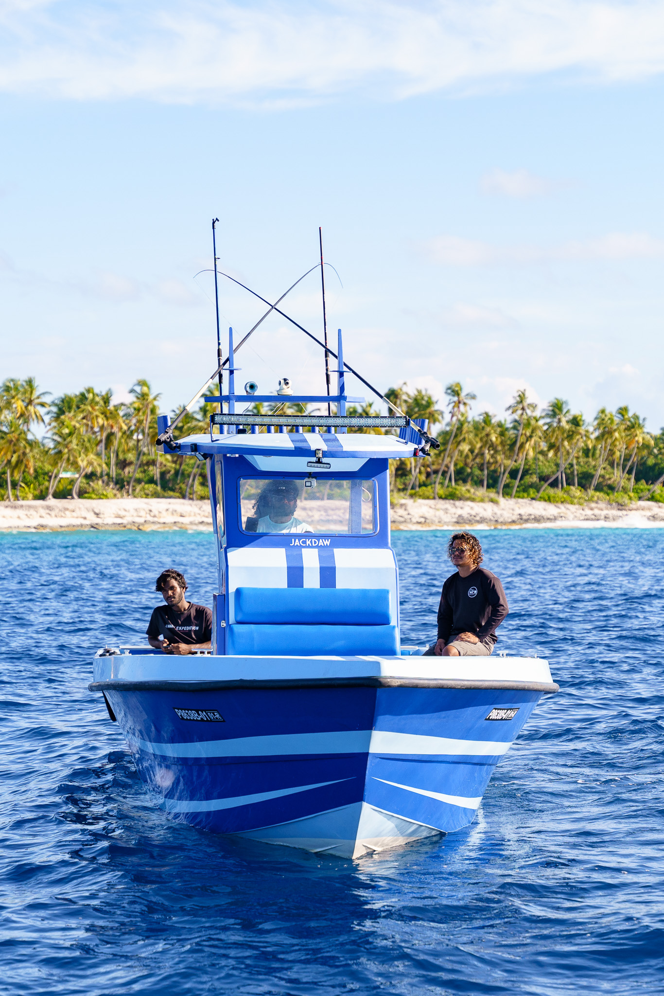 Cabin cruiser front view near shore showing cabin design